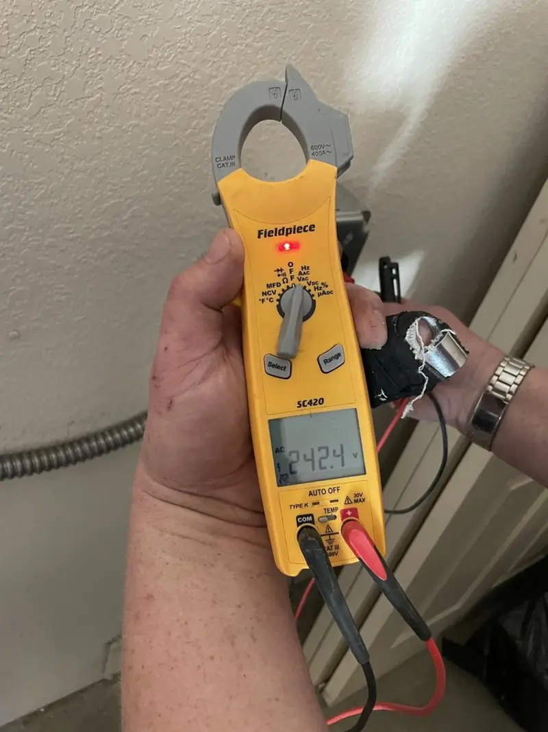 Voltage testing with clamp meter during Electrical Installation Services in Beverly Hills